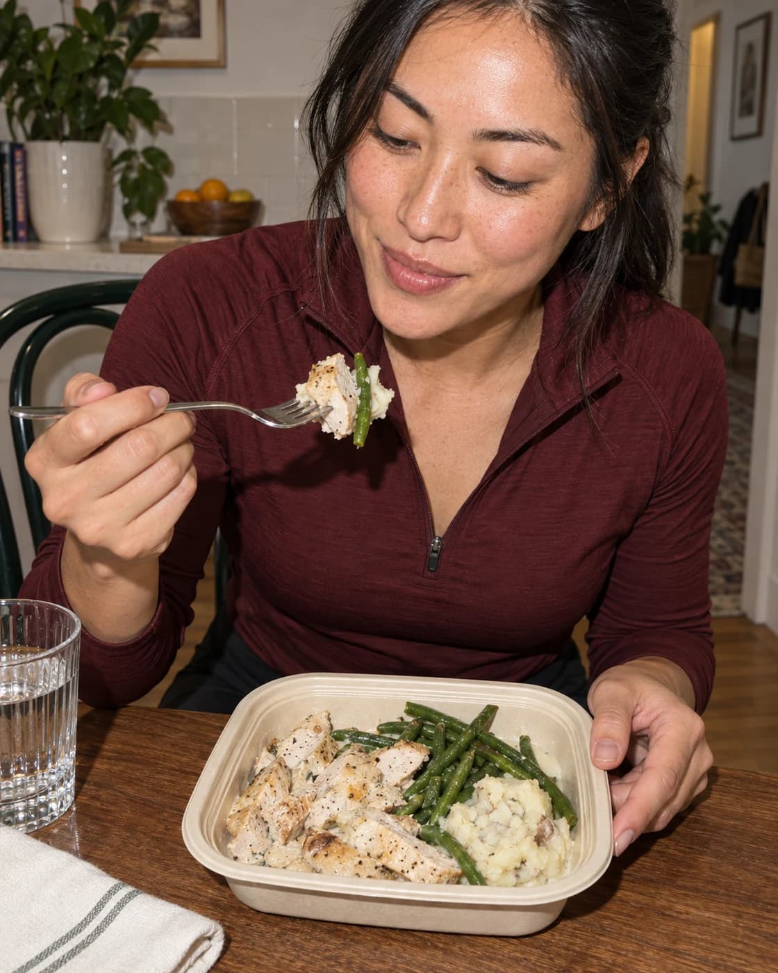 An athlete enjoying a prepared meal after training